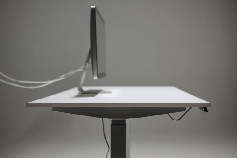 A tidy desk with neatly managed cables, seen from above