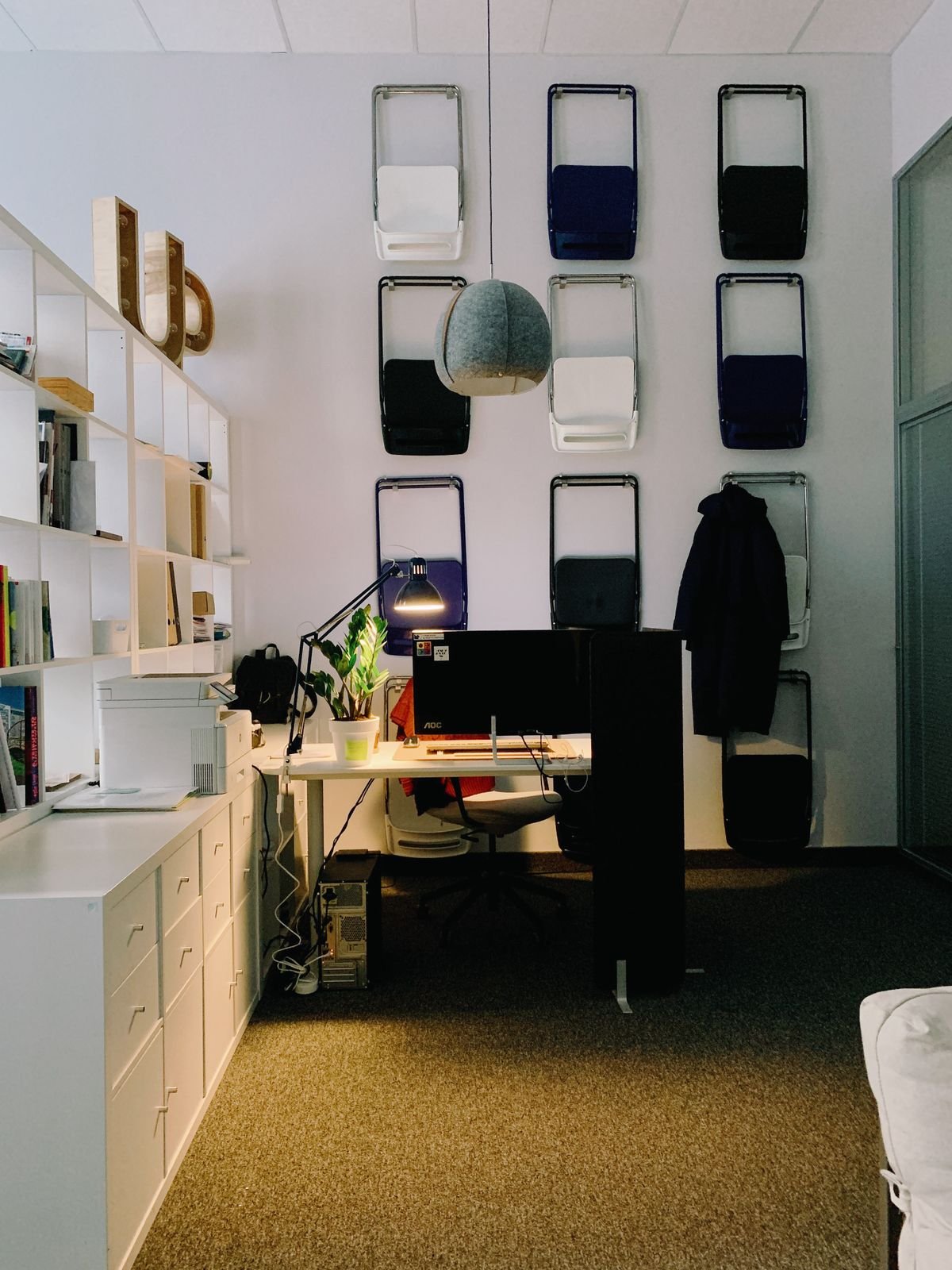 Desk dimensions shown on a compact desk with shelves
